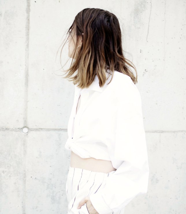sylvie-tittel-woman-standing-by-wall-life-coach-therapist-head-shot